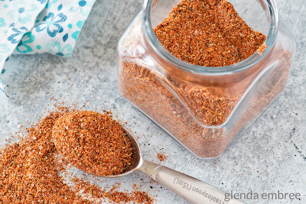 Southwest Seasoning blend in a clear glass storage jar.